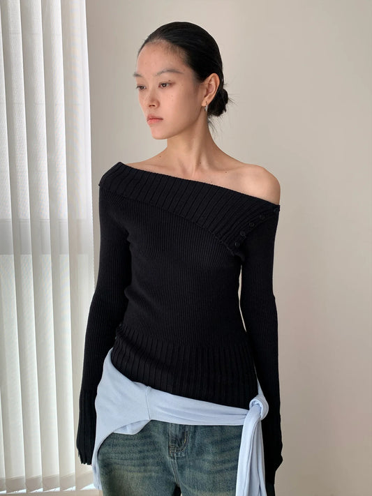 Suéter feminino preto ombro a ombro.