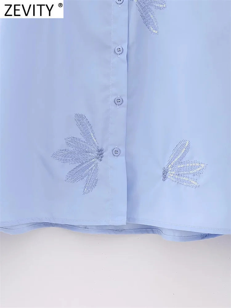 Blusa feminina fashion com bordado de flores em paetê, modelo curto estilo smock, manga longa, camisa cropped elegante para escritório