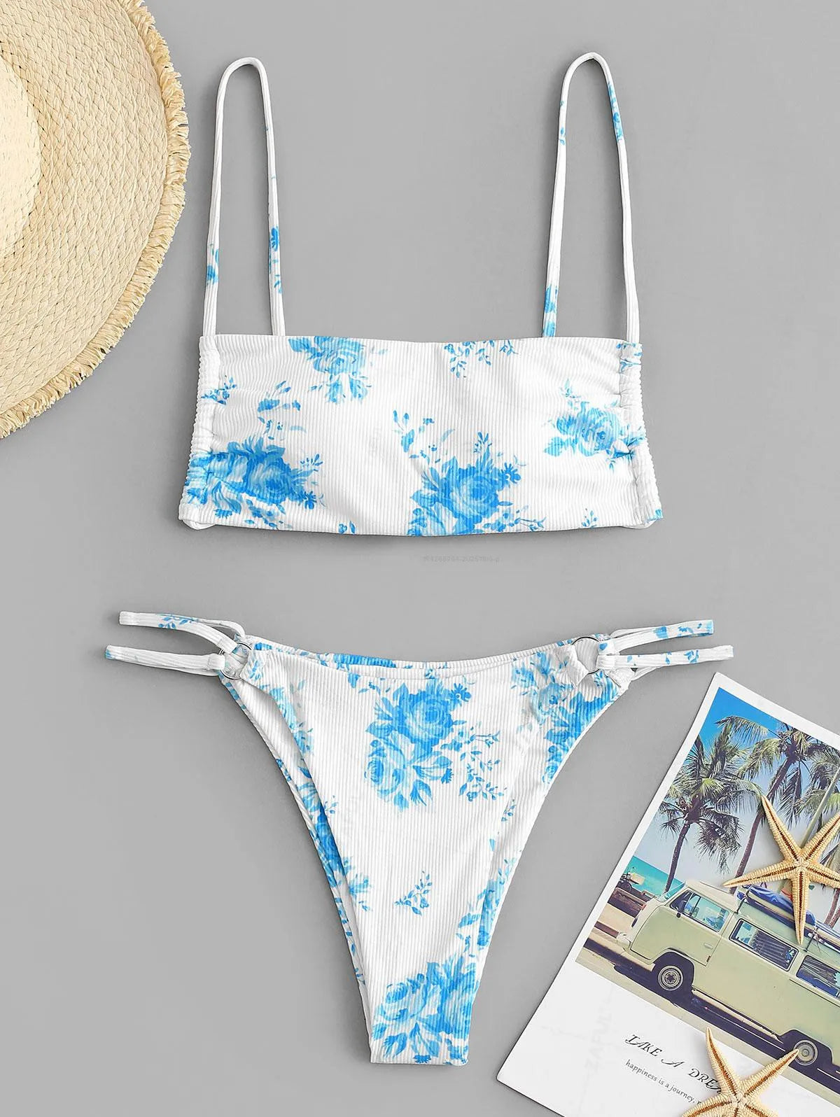 Biquíni fashion com estampa de rosas azul.